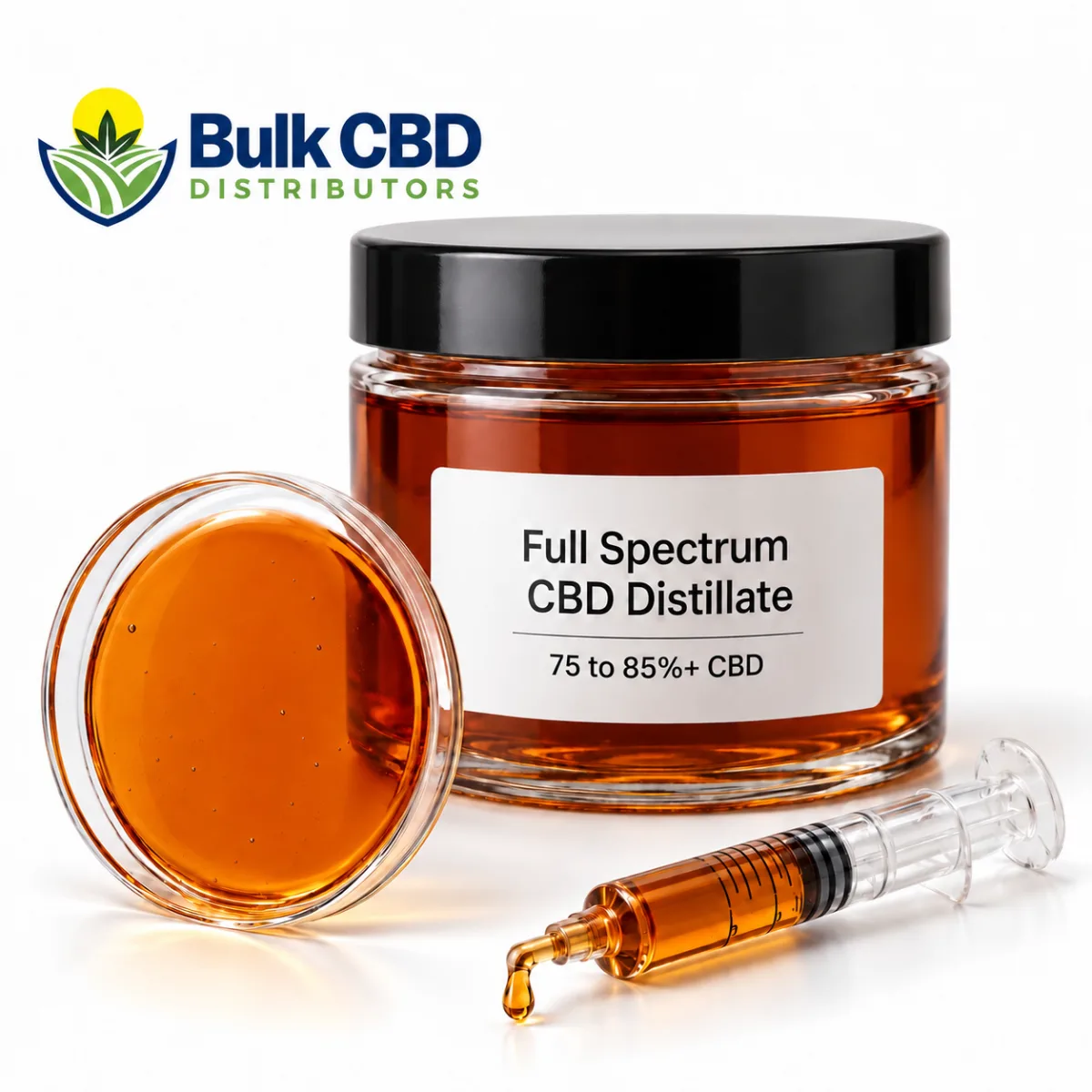 Amber full spectrum CBD distillate in a glass jar with a dish of the oil and a syringe